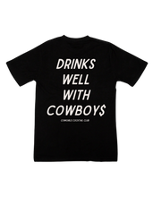Load image into Gallery viewer, Drinks Well With Cowboys - Graphic Tee
